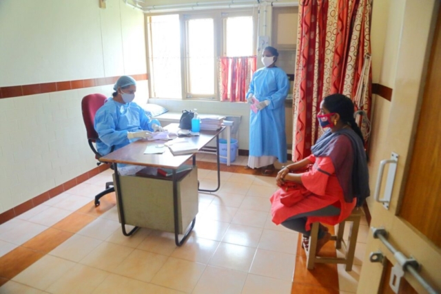 DR.KAMALA ATTENDING THE PATIENT